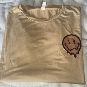 Tan T-Shirt with Smiley Face Graphic
